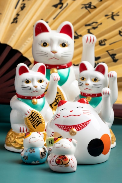 Lucky cats arrangement with fan