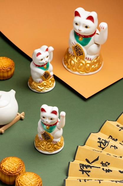 Lucky cats assortment with green background