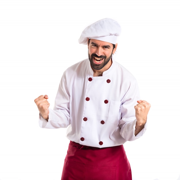 Lucky chef over isolated white background