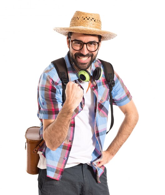 Lucky tourist over white background