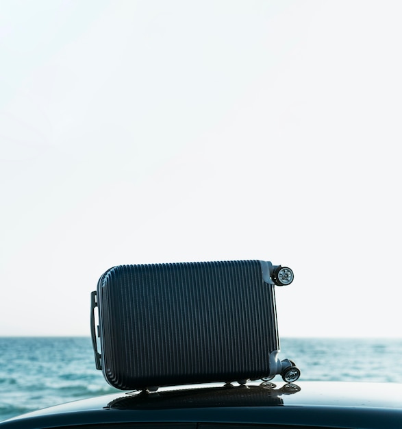 Luggage sitting on top of car