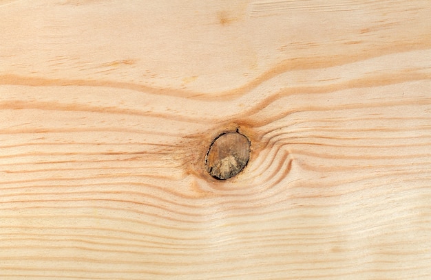 Lumber board with knot