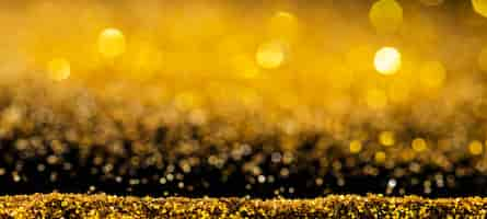 Free photo lustrous golden glitter