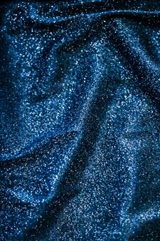 Роскошная светящаяся текстура, брендинг ночного клуба и концепция новогодней вечеринки, синий праздник, сверкающий блеск, абстрактный фон, роскошный блестящий тканевый материал для гламурного дизайна и праздничного приглашения
