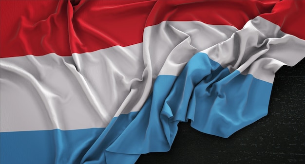 Free photo luxembourg flag wrinkled on dark background 3d render