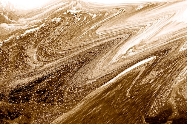 Luxurious golden fluid textured background