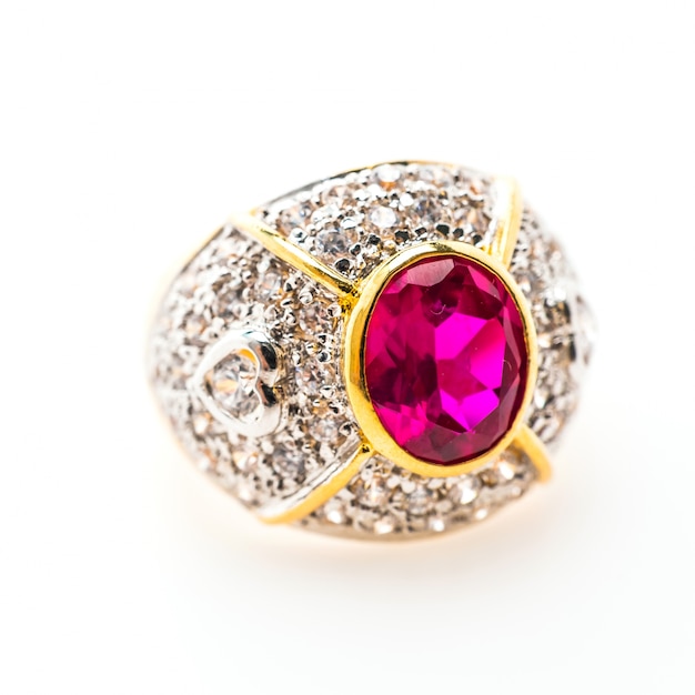 Luxurious golden ring with purple gemstone