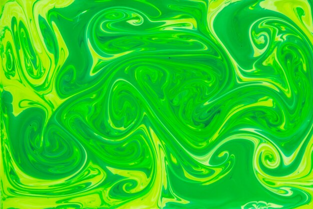 豪華なライムグリーンのユニークな液体の背景