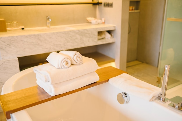 luxury bathtub and towel inside bedroom in hotel