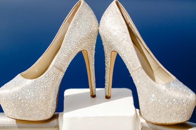 Luxury heels for bride on the balcony