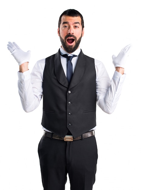 Free photo luxury waiter doing surprise gesture