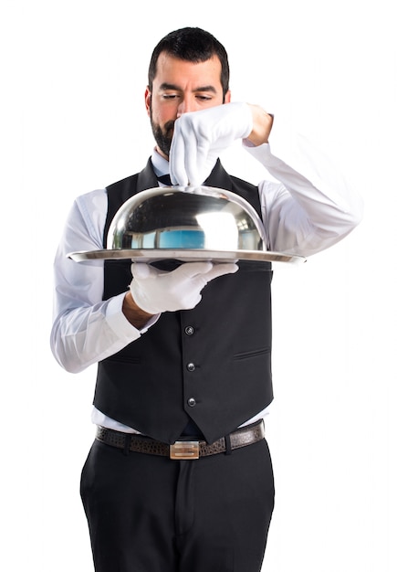 Free photo luxury waiter holding a tray