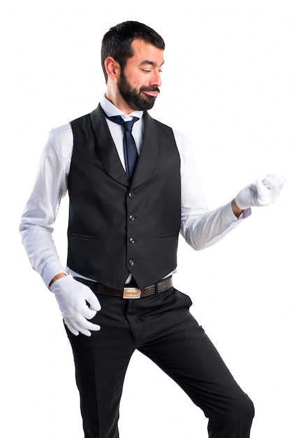 Luxury waiter making guitar gesture