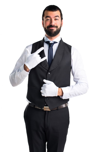 Luxury waiter making horn gesture