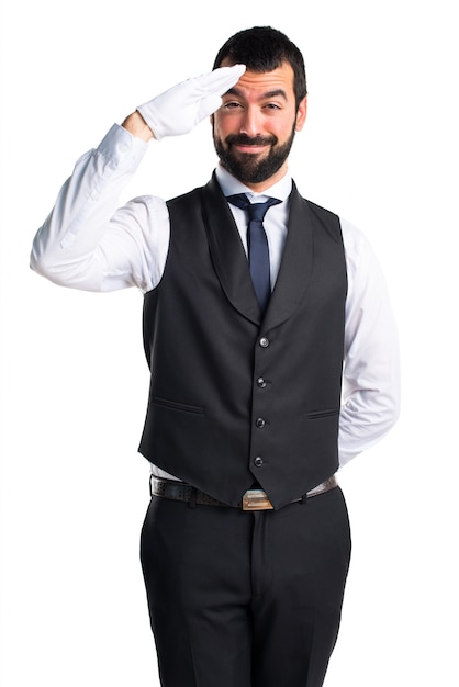 Luxury waiter saluting