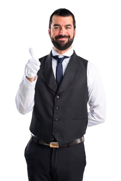 Luxury waiter with thumb up