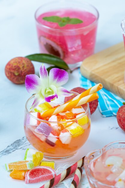 Lychee jelly, seasonal fruit and beautifully decorated Thai dessert concept.