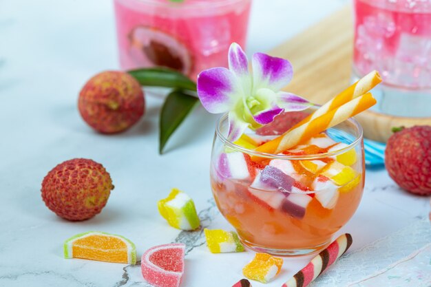 Lychee jelly, seasonal fruit and beautifully decorated Thai dessert concept.