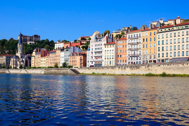 Lyon cityscape from Saone river with colorful houses and river