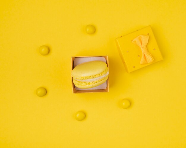 Macaroon in gift box all yellow top view