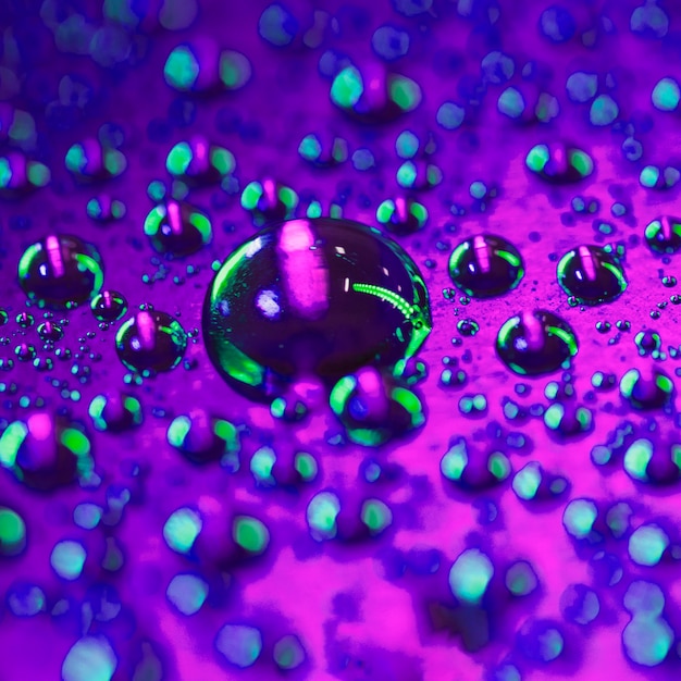 Macro detail of water bubble on the bright surface