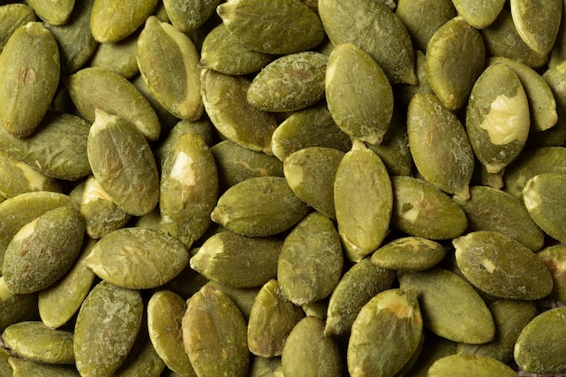 Free photo macro green pumpkin seeds  texture .