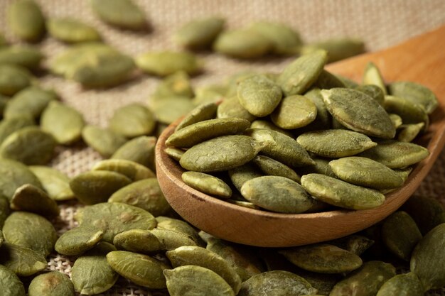 Macro green pumpkin seeds  texture .