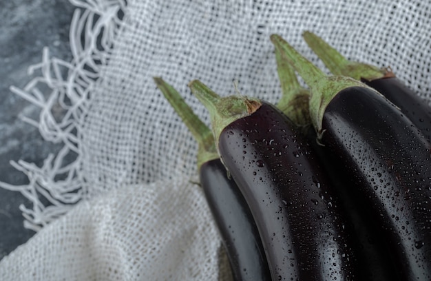 Free photo macro photo of fresh raw aubergines.