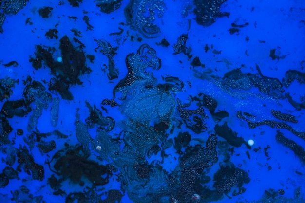 青い水彩テクスチャ背景のマクロの表示