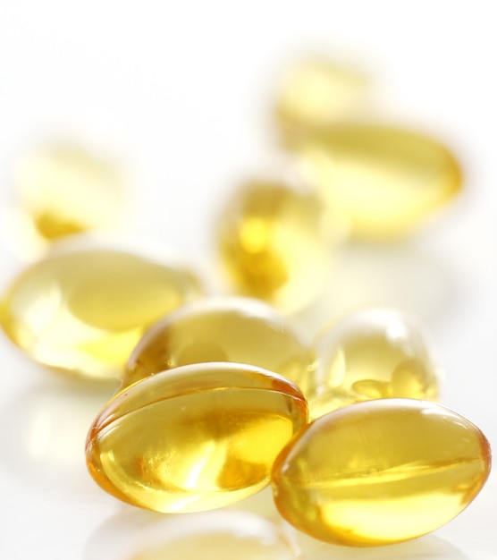 Free photo macro of yellow gelatin pills