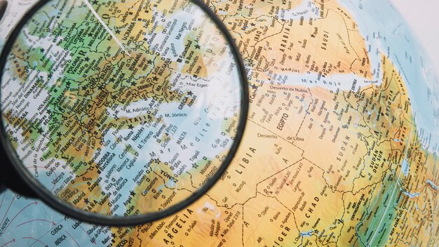 Magnifying glass over Europe on globe