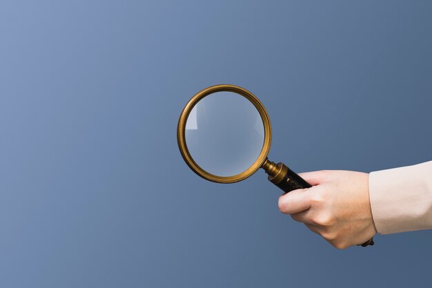 Magnifying glass research business symbol