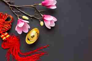 Free photo magnolia and pendant chinese new year