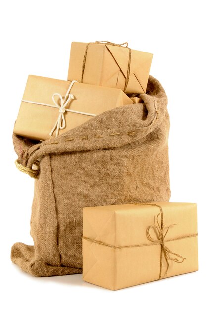 Mail bag filled with brown paper parcels