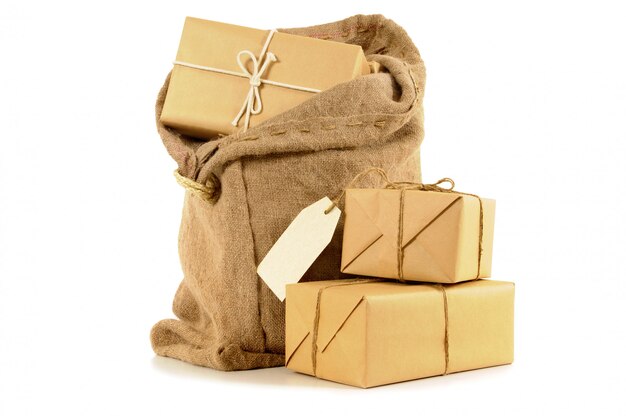 Mail bag filled with brown paper parcels