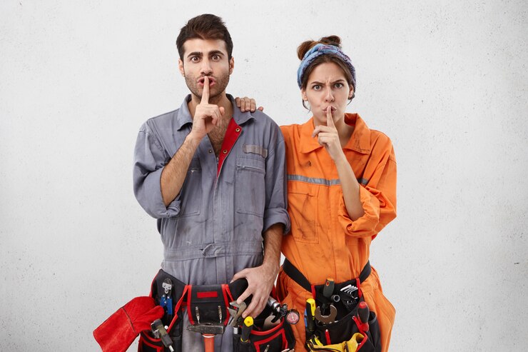 Free Photo maintenance workers in special unform and tool belts
