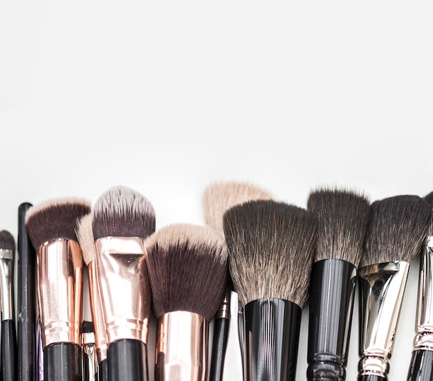Make up brushes on plain background