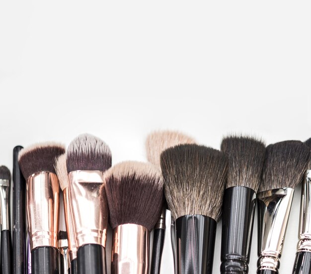 Make up brushes on plain background