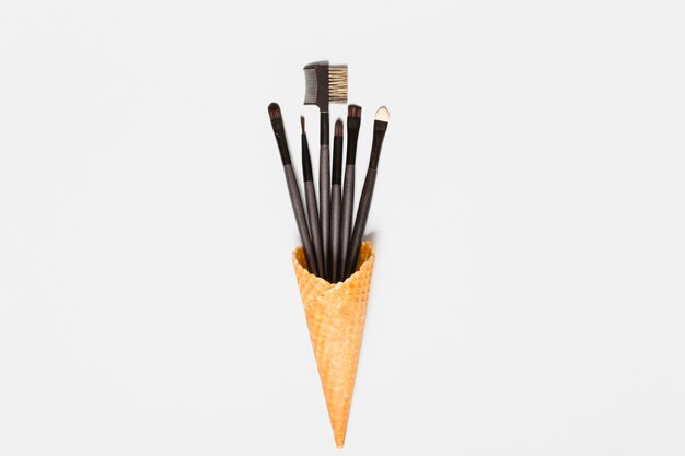 Makeup brushes in ice-cream cone
