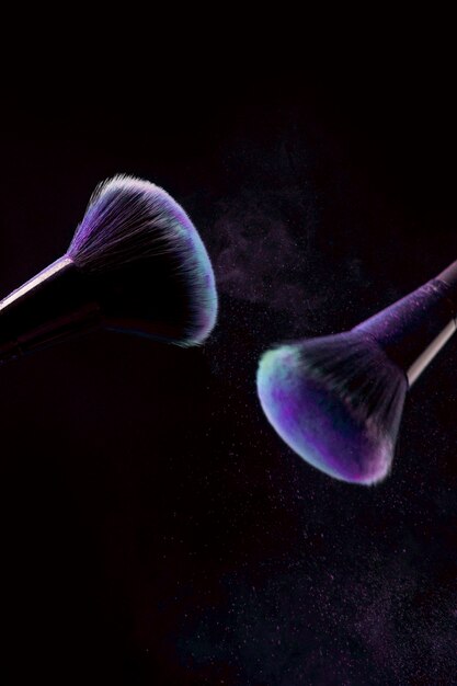 Makeup brushes in ray of light