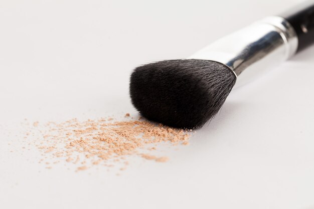 Makeup natural brush with beige powder