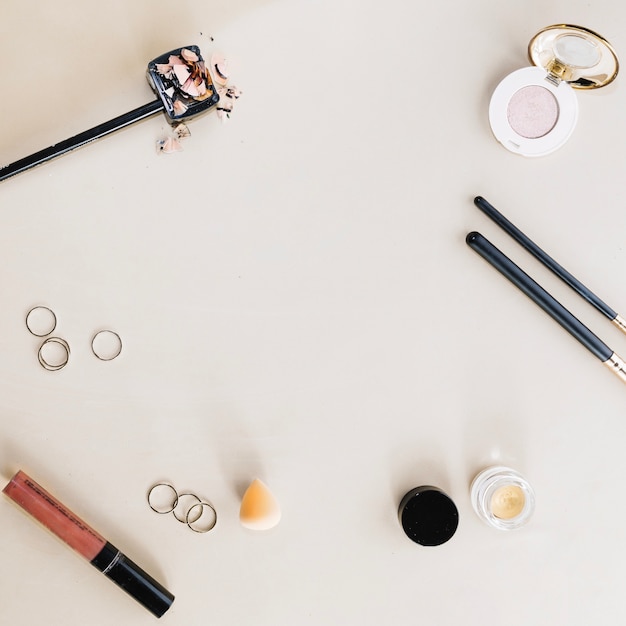 Makeup supplies on white background