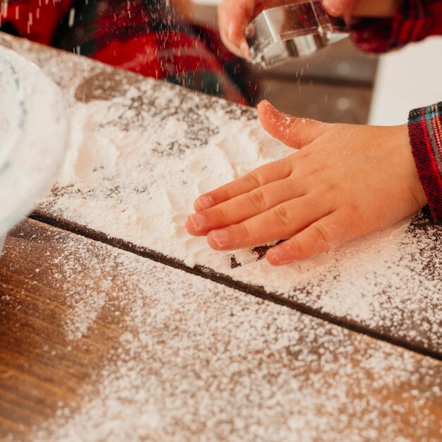 Making of a christmas cookie with flour