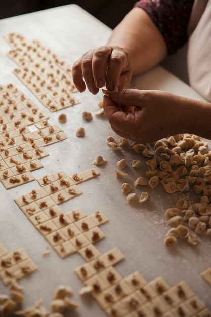 Making dough khinkali in the kitchen