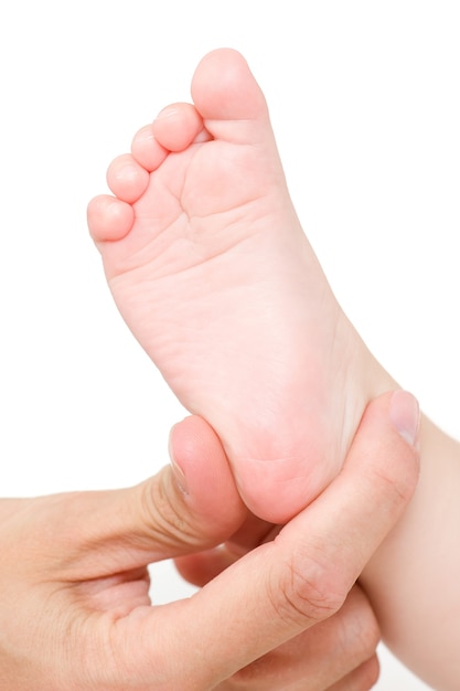 making massage of child's foot