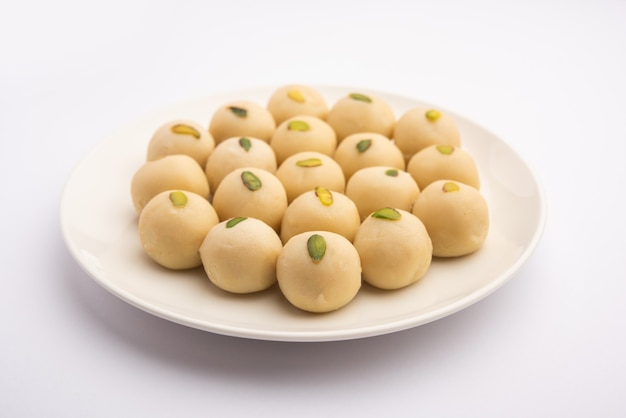 Malai peda or white pera is a north indian sweet mithai or delight, prepared with full cream milk, sugar and cardamom