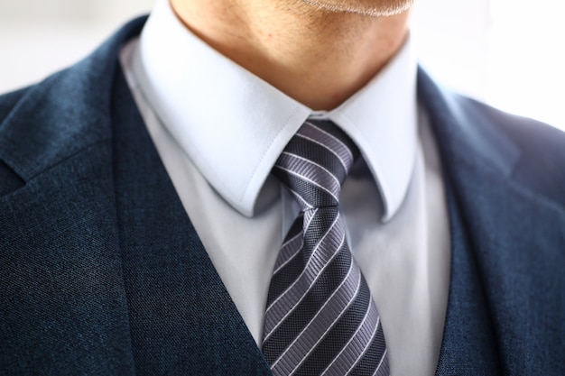 Premium Photo | Male arm in blue suit set tie closeup