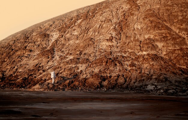 male astronaut exploring during a space mission on another planet