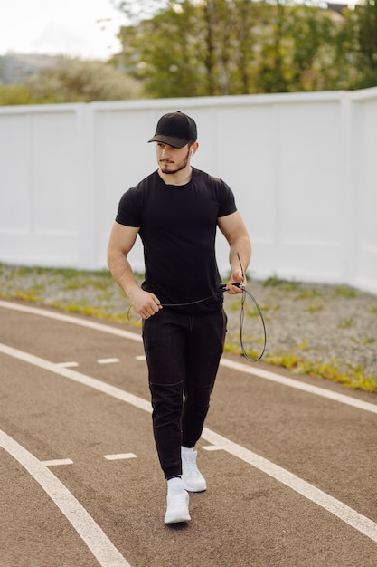 Male athlete doing fitness training. Workout outside the gym.