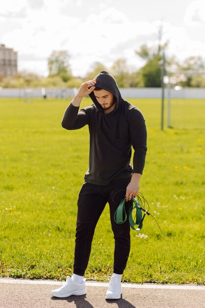 Male athlete doing fitness training. Workout outside the gym.